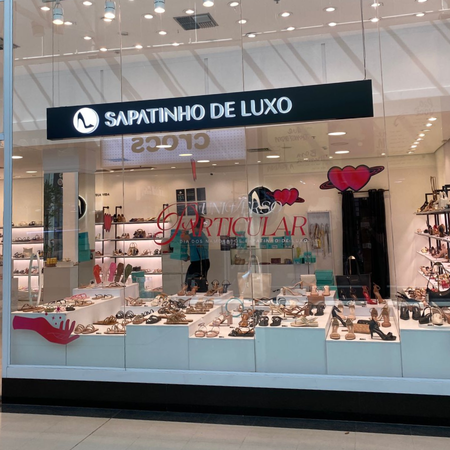 Logo da loja sapatinho de luxo